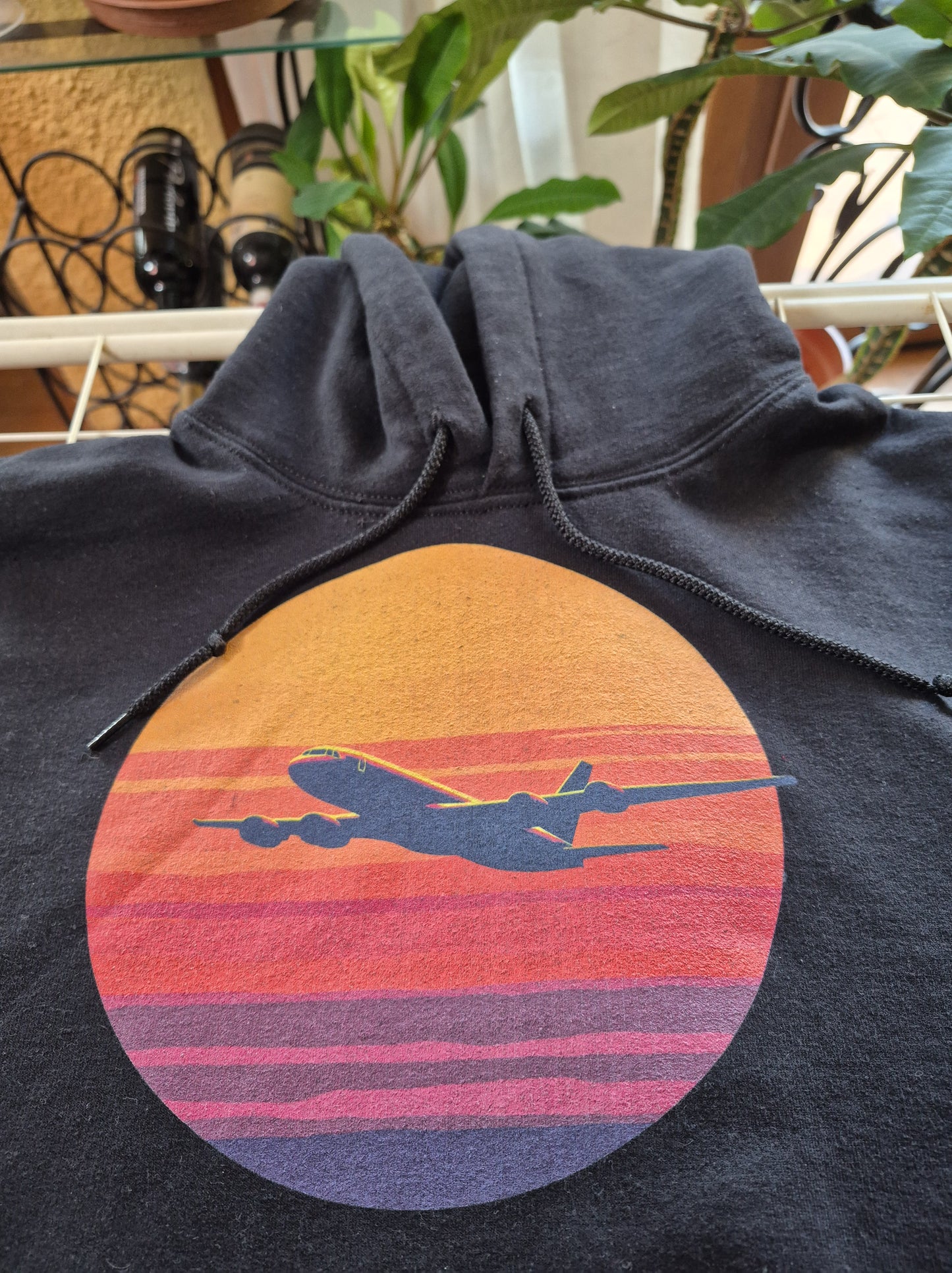 detail of the "airliner against sunset" hoodie